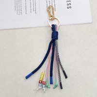 Cuerda trenzada hecha a mano con letras en inglés para colgar en mochilas, borlas decorativas para bolsos, cordón de cincha y llavero