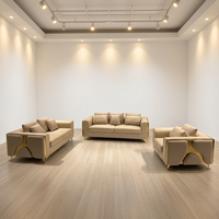 Ensemble de canapés sectionnels modernes en cuir véritable avec accents métalliques dorés, design contemporain pour appartement, salon, hôtel, confortable