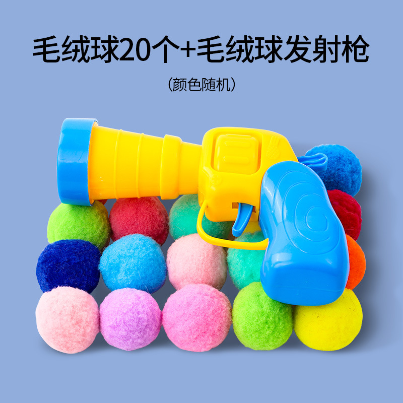 Lanceur de balles (un seul coup) avec 20 balles en peluche.