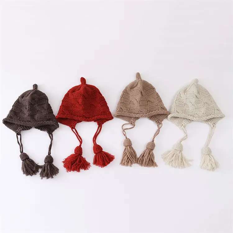 秋と冬のファッションニットタッセルウォームイヤーキャップベビーハンドメイド帽子工場価格