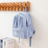 Sac à dos en velours côtelé personnalisé en gros avec oreilles de lapin, poche avant zippée, poches latérales à cordon de serrage, bretelles réglables
