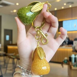 Wholesale Gilded Pear Keychain Elegant Green & Gold Pear Pendant with Triple <b>Leaves</b> Fashionable Bag Charm & Keyring Accessory - Product Image 1