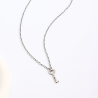 Bijoux maître-esclave de style serrure gravés avec une serrure en forme de coeur pour collier de couple de bonnes filles avec pendentif serrure à clé