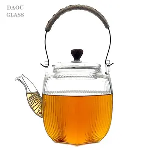 Handmade hexagonal glass Crafted Gift Teapot comes with an iron girder wrapped with hemp string and Spring strainer