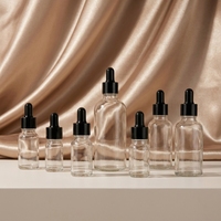 Flacon compte-gouttes en verre transparent noir personnalisé, de 5 ml à 100 ml, avec bouchon à vis et sérigraphie pour huiles essentielles