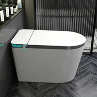 WC intelligent monobloc en céramique, à poser au sol, allongé, avec couvercle ouvrant/fermant et siège de bidet électrique chauffant