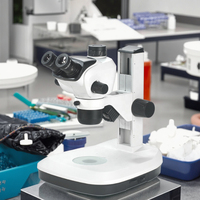 ZM6553T-E2L 0.65X-5.3X Greenough Trinocular Stereo Microscope With Reflecting & Transmitting Illumination