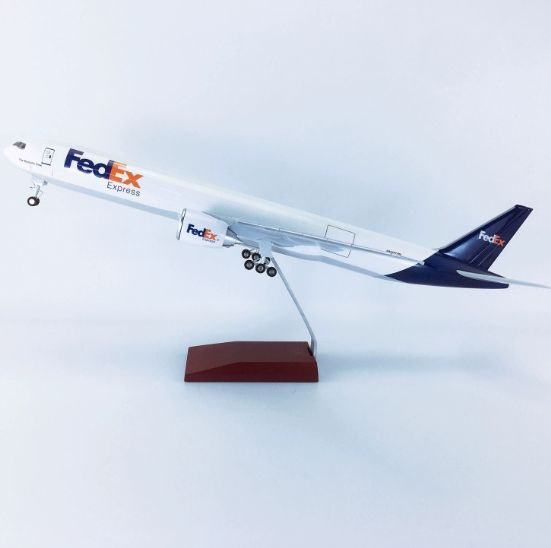 white- FedEx B777-300er with wheels