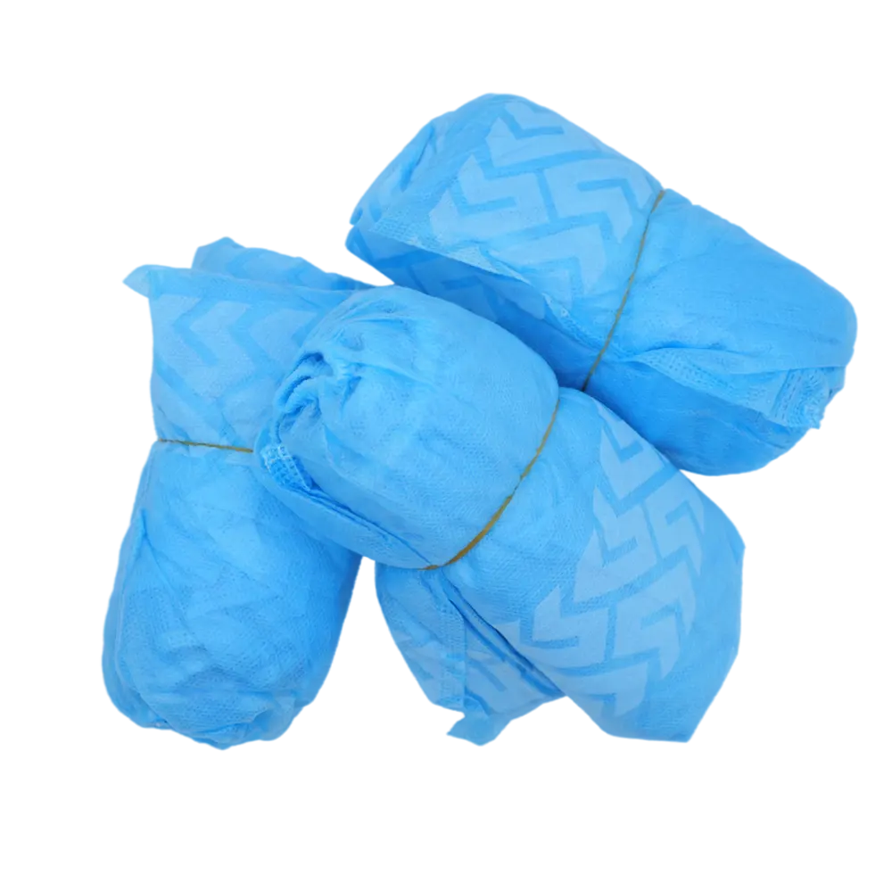 Paquete de 100 pares de cubiertas de zapatos desechables no tejidas impermeables cubiertas de Botas Azules