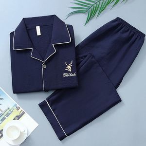 Grosir katun pria musim semi kualitas tinggi Set piyama Solid kancing panjang longgar untuk pria pakaian tidur lembut nyaman
