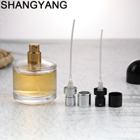 Flacon de parfum rond personnalisé de 50 ml avec pulvérisateur à pompe, flacon de parfum en verre élégant et luxueux à fond épais avec boîte