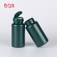 Vert HDPE Mat de Qualité Alimentaire 60ml avec Personnalisé Flip Top Cap Métallique Capsules Capsules Tablette Supplément Vitamine Bouteille