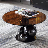 Table basse sphérique en verre noir moderne, minimaliste et durable, avec structure en métal, pour salon