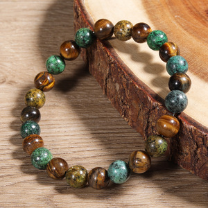 Bracelet élastique en pierres naturelles avec perles de jaspe australien, turquoise paon, opale éthiopienne naturelle et laiton argenté - Product Image 1