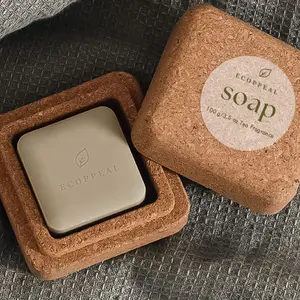 Vente en gros de pains à l'huile essentielle d'avoine naturels et bio personnalisés, barre de savon blanchissant fait main pour le visage au lait de chèvre avec plat