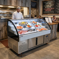 Table de présentation commerciale à plateau en verre pour fruits de mer frais entiers, idéale pour les marchés et les commerces de détail.