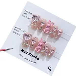 Venta al por mayor hecho a mano 3D diamantes de imitación de lujo no coincidentes 10 unids/set prensa en las uñas artificiales