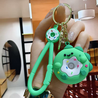 Porte-clés créatif en PVC souple avec pendentif animal en forme de beignet Accessoire mignon en caoutchouc pour voiture Vente en gros Imprimé UV