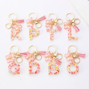 Colgante de mariposa floral de resina, accesorios metálicos con letras doradas y rosas, llavero con inicial de lentejuelas coloridas - Product Image 5