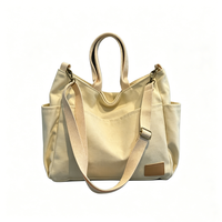 Sac fourre-tout en toile multi-poches avec fermeture éclair, sangle réglable et amovible pour une utilisation en bandoulière et à la main