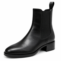 Bottes Chelsea noires en similicuir pour femmes, à talon carré bas, avec élastique latéral, à enfiler, tendance pour les détaillants de boutiques