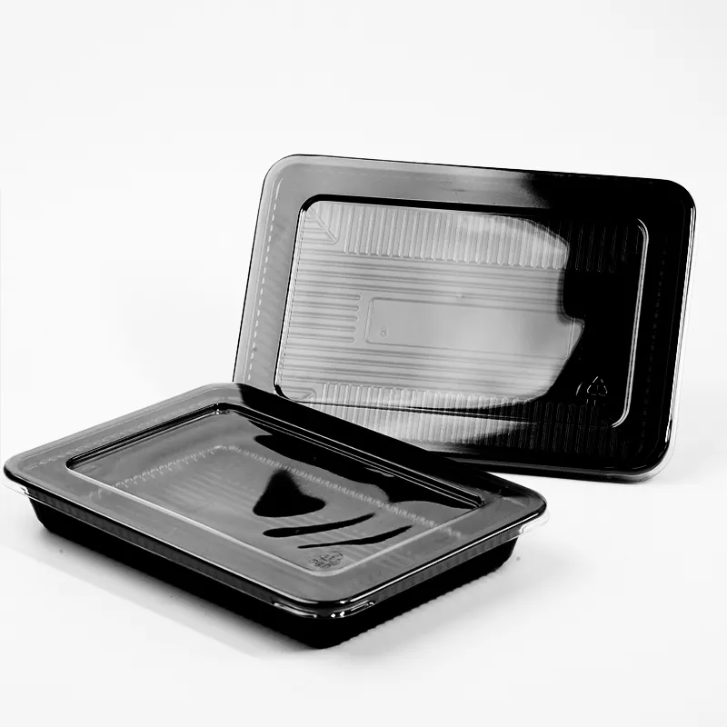 Black disposable food with transparent plastic rectangular tray for holding lamb and beef rolls