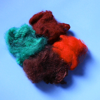 Fibre de polypropylène colorée pour tapis aiguilleté