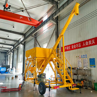Type mobile machine de déchargement de sac enorme machine de décharge de trémie de sable de poudre sèche de cendres volantes de ciment