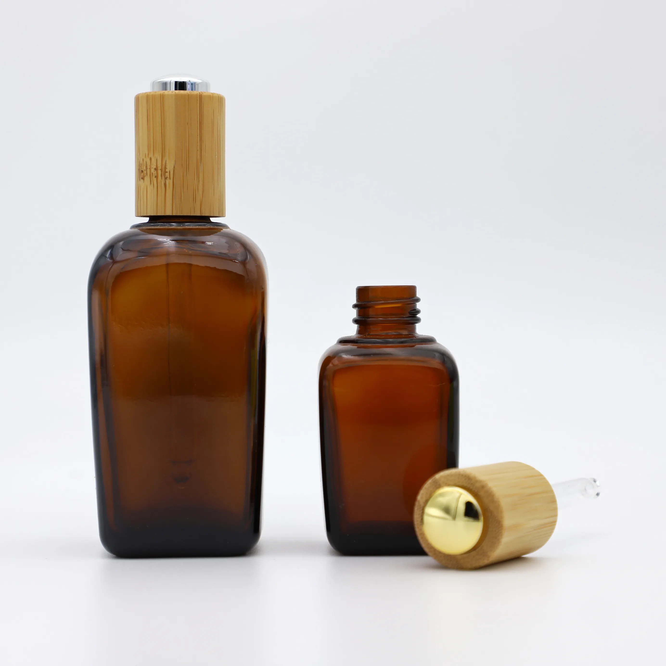 Flacon compte-gouttes en verre ambré de 30ml 50ml 100ml avec couvercle en bambou pour emballage cosmétique