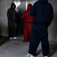 Ensemble de survêtement 2 pièces coupe ample avec sweat à capuche court et pantalon de survêtement, en molleton brossé, avec coutures apparentes et empiècements incurvés, style streetwear