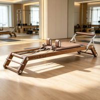 Máquina de Pilates Reformer de Madera Sólida de Calidad Profesional con Tabla de Salto y Caja de Sentado para Equipamiento de Gimnasio Premium