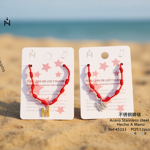 Cavigliera in acciaio inossidabile a sette nodi con lettera M e cordoncino rosso per donna, gioiello alla moda. - Product Image 3