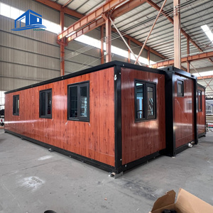 Kapselhaus Maison Modulaire Préfabriquée Moderne Extensible Conteneur d'Origine Shandong Garantie 1 An <span class=keywords><strong>Immobilier</strong></span> à Vendre - Product Image 2