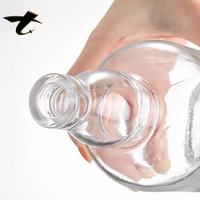 Bouteilles de vin en verre super clair 500ml/700ml/750ml avec bouchon en liège, forme ronde, emballage estampé or