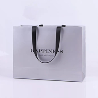 Sacs en papier laminés avec logo en feuille d'or personnalisés et recyclables, emballage de luxe, papier blanc de qualité supérieure, sacs cadeaux pour vêtements, sacs de magasinage