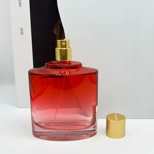 Botellas de perfume de vidrio de color rojo con forma ovalada transparente de 112ml