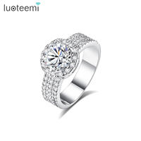 Bague de mariage tendance LUOTEEMI en laiton au design classique avec zircon cubique rond pour femme