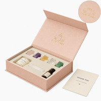 Boîte cadeau magnétique en carton rigide avec logo personnalisé et insert en mousse EVA pour bougie, bâton de sélénite, huile essentielle et cristaux