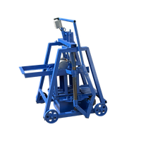 Machine de fabrication de blocs de ciment