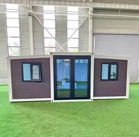 Maison préfabriquée moderne à double aile de 20, 30 ou 40 pieds, 1 à 4 chambres, aménagement personnalisable avec entrée centrale en verre, maison-conteneur
