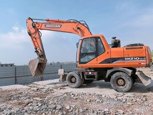 รถขุดล้อยาง Doosan DH210W-7 มือสอง สีเดิมจากโรงงาน ยางดี เครื่องยนต์ เกียร์ มอเตอร์ ใช้งานได้ดี - Product Image 5