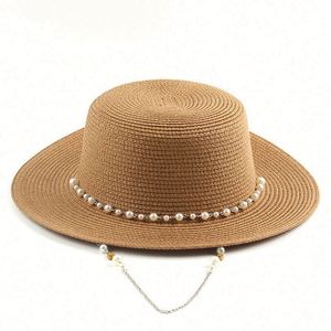 Wholesale Seaside Sunshade Paper Sun Beach <b>Hats</b> <b>Flat</b> Round Top Womens Straw <b>Hats</b> With Pearl Chain - Product Image 1