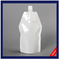 Vente en gros de pochette Doypack en plastique transparent liquide BOPP étanche personnalisée avec bec pour le stockage de l'eau de jus de bière