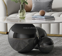 Offres Spéciales Table basse à cadre sphérique en acier inoxydable Table basse noire créative à la mode Table à thé ronde de luxe en pierre frittée