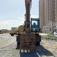 Excavatrice sur pneus d'occasion CAT M320 Caterpillar M320 21 tonnes avec moteur C4.4 Stage V, attache rapide et stabilisateurs pour travaux routiers municipaux