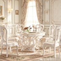 Französisches Luxus-Esszimmer-Set mit Rundem Marmortisch, Handgeschnitzten Massivholz-Lederstühlen und Drehbarem Esstisch