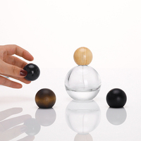 Design Fantaisie Boule Ronde Clair À Sertir Vide Unique Cologne 30ml 50ml 80ml Parfum Vaporisateur Bouteille En Verre Avec Bouchon En Bois