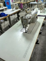Machine à coudre JUKI d'occasion DDL-9000B-SS Machine à coudre à plat informatisée à aiguille simple