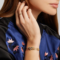 Bracelet ajustable Gemnel Fashion Style Hip Hop avec breloque émeraude et grappe de zircons cubiques baguette étincelants