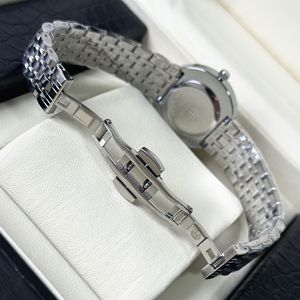 The new ladies' wristwatch features a high-quality mother-of-pearl <b>face</b> and a steel band. It is also water-resistant. - Product Image 5